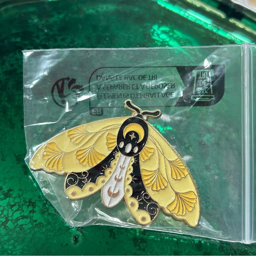 Botanical moth pin